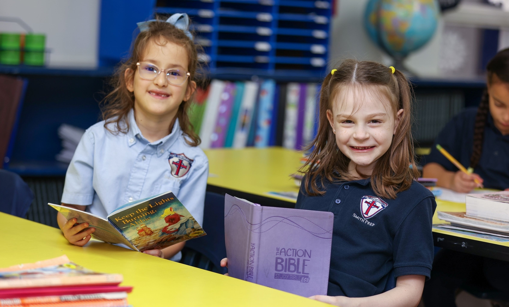 Two girls reading